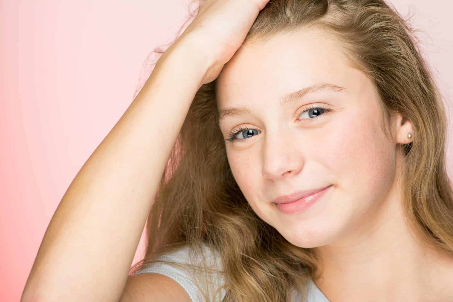 Young girl wearing a white shirt